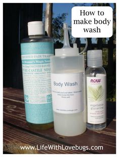 three bottles of body wash sitting next to each other on a wooden table with the words how to make body wash written above them