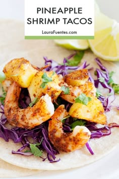 a close up of a plate of food with shrimp and cabbage