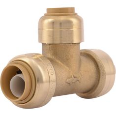 a brass colored valve on a white background