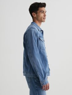 The Dart Jacket gets a streamlined update for a clean, modern look. Made from Aerial Nylon Denim in a medium wash, it's every bit as versatile as the classic trucker jacket. Designed with flap  pockets at the chest and concealed hip pockets discreetly worked into the side seams.Airluxe™, Aerial Nylon Denim, 73% Cotton, 25% Polyamide, 2% Polyester Ag Jeans, Character Poses, Trucker Jacket, Clean Modern, Jacket Sale, Dart, Flap Pocket, Perfect Fit, Coats Jackets