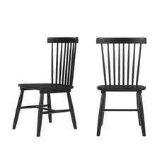 two black chairs sitting next to each other on a white background and one is empty