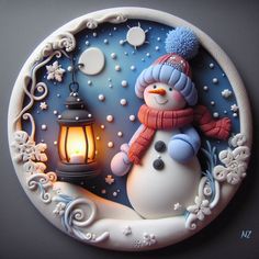 a snowman holding a lantern on top of a plate with frosting around it