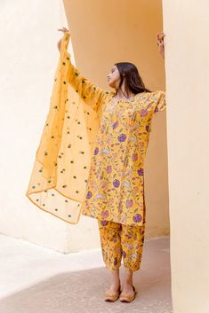 Cotton Yellow Printed Suit Set with Doriya Dupatta The set consists of printed kurta teamed with matching printed pajama and a doriya dupatta with embroidery detailing Kurta Length-39 inches Palazzo Length-34 inches Dupatta Length-2.5 meters Work-Print Detailing Color-Yellow Kurta Fabric-Cotton Bottom Fabric-Cotton Dupatta Fabric-Doriya Model Size- 5.8 tall wearing small size Sleeves - 3/4th Sleeves Neck-Round neck Washing Care-Hand wash or Dry Clean Yellow Kurta, Printed Pajama, Printed Suit, Embroidery Detailing, Cotton Dupatta, Cotton Bottoms, Yellow Print, Print Pajamas, Indian Ethnic Wear