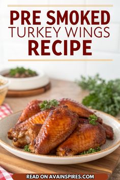 chicken wings on a plate with parsley in the background text reads, pre smoked turkey wings recipe