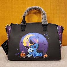 a handbag with an image of stitch and stitch on it