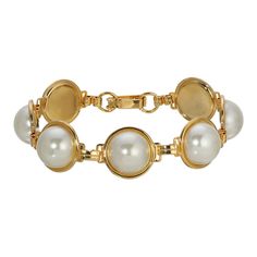 Turn heads in this simulated pearl-embellished gold tone statement bracelet from 1928. Turn heads in this simulated pearl-embellished gold tone statement bracelet from 1928. FEATURES Length: 7.25 in. Clasp: fold-over Metal: alloy Plating: gold tone Finish: polished Material: acrylic Not appropriate for children 14 years old and younger. Size: One Size. Color: White. Gender: female. Age Group: adult. Classic Metal Pearl Bracelet For Formal Occasions, Chic Fashionista, Love Day, Faux Pearl Bracelet, 1928 Jewelry, Vintage Inspired Jewelry, Statement Bracelet, Pearl Bracelet, Pearl Jewelry