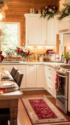 a kitchen filled with white cabinets and lots of counter space next to a stove top oven