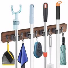 several different types of umbrellas hanging from hooks