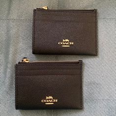 These Coach Crossgrain Leather Cardholders Are The Ideal Substitute For A Wallet When You Are On The Go And Need To Carry As Little As Possible! Each Cardholder Features An Id Window, 2 Card Slots, A Zipper For Cash And Change, An A Keyring If You Need To Attach It To A Lanyard Or Other Keys. Both Brand New With Tags, Never Been Used Before. Great For Gift Giving! *The Prices Listed Reflect The Total For Both Cardholders* Black Coach Card Holder, Xoxo Jewelry, Coach Eyeglasses, Cardholder Wallet, Snap Bag, Picture Locket, Phone Wristlet, Silver Keychain, Coach Jewelry