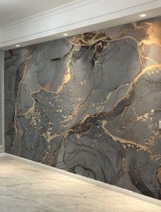 a large marble wall in an empty room