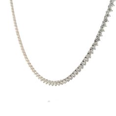 Add some sparkle to your look with this diamond necklace. Crafted from 14 karat white gold, this piece features 114 round brilliant cut diamonds totaling 16.60 carats. Each diamond, measuring 3.4 mm, is carefully chosen for its VS2 clarity and H color, ensuring symmetry across the piece. The three-prong basket settings secure the diamonds while allowing their natural beauty to shine. Formal Round Tennis Necklace With Pave Setting, Silver Tennis Necklace With Pave Setting For Formal Occasions, Formal Silver Tennis Necklace With Pave Setting, Anniversary Tennis Necklace In Diamond White With Brilliant Cut, Diamond White Brilliant Cut Tennis Necklace, Dazzling Diamond White Tennis Necklace With Diamond Cut, Fine Jewelry Platinum Tennis Necklace With Brilliant Cut, Dazzling Diamond White Necklace With Prong Setting, Platinum Tennis Necklace With Diamond Accents