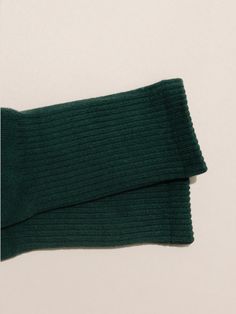 Meet our new crew socks, the epitome of comfort and a perfect fit. Made from a thoughtfully curated spandex blend, these lightweight crew socks are not only comfortable enough but also durable enough for everyday wear. The deep, rich hue of these pine green crew socks brings a sense of groundedness to your wardrobe. Whether you’re looking for crew socks for sneakers, crew socks for boots, or cozy crew socks to lounge around in, you will find yourself reaching for these time and time again. Color Green Stretch Socks For Fall, Stretch Green Socks For Fall, Socks For Sneakers, Socks For Boots, Crew Sock, Pine Green, Boot Socks, Green Fabric, The Deep