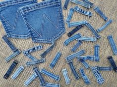 several pieces of blue jeans with holes in them