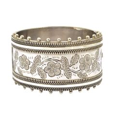 A wide hinged Victorian bangle hallmarked sterling silver, 1883. In good condition, the catch is in good working order.  The internal measurements are 5.4 cms (2 1/8 inches) x 5.1 cms (2 inches). The internal circumference is 17 cms (6 5/8 inches), The bangle is 3.2 cms (1 1/4 inches) wide, excluding the bobbles. For more bangles please look at my bracelets and bangles section here; https://www.etsy.com/uk/shop/DaisysCabinet?section_id=16212877&ref=shopsection_leftnav_6 Luxury Ornate Sterling Silver Bangle, Luxury Antique Sterling Silver Bangle Bracelet, Luxury Antique Style Sterling Silver Bangle, Antique Hinges, The Catch, Hinged Bangle, Uk Shop, Bangle Bracelets, Jewelry Bracelets