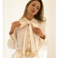 Embroidered Front Tie, Button-Down Blouse Embroidered White Shirt For Work, Embroidered White Shirt For Workwear, White Embroidered Shirt For Workwear, White Button-up Tops With Pearl Buttons, White Button-up Blouse With Pearl Buttons, Elegant Embroidered Button-up Blouse, White Button-up Top For Wedding, White Tops With Pearl Buttons For Workwear, Feminine White Button-up Shirt