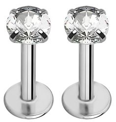 pair of stainless steel studs with clear crystal stone on each end, set against a white background