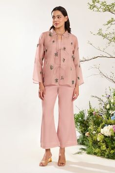 Pink jacket with front tie-ups and floral, beaded hand embroidery. Paired with an inner top and pant. - Aza Fashions Spring Festive Palazzo Set With Set-in Sleeves, Chic Sets With Resham Embroidery For Spring, Chic Festive Palazzo Set For Spring, Festive Chic Spring Palazzo Set, Festive Spring Palazzo Set With Set-in Sleeves, Spring Workwear Long Sleeve Palazzo Set, Embellished Pant Set For Spring Wedding, Embellished Pant Set For Wedding, Spring Wedding Embellished Pant Set