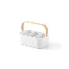 a white container with two compartments and a wooden handle