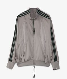 Born in Germany, adidas has been a trailblazer in the sports and lifestyle industries since its inception. Known for merging innovative design with timeless style, the brand continues to set the pace in global fashion.Get ready for the Fall/Winter 2024 season with the adidas Track Jacket x Song for The Mute. This collaboration blends adidas' iconic sports heritage with avant-garde elegance, perfect for those looking to stand out in style. This athletic jacket, cloaked in a sophisticated gray, ma Style Sportif, Adidas Track Jacket, Adidas Track, Half Zip Sweatshirt, Fall Winter 2024, Adidas Running, Running Leggings, Bank Card, For The