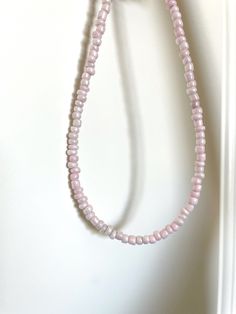 handmade pink seed bead necklace * approximately 15 inches but feel free to message me to request a custom length! * beads are made of glass * perfect for summer! 💗 30% of profits donated 💗 ships in environmentally friendly packaging 💗 free shipping over $35 💗 comes with a free sticker Y2k Beaded Necklace, Seed Bead Necklace Choker, Pink Y2k, Y2k Jewelry, Bead Choker, Seed Bead Necklace, Pink Beads, Necklace Choker, Beaded Choker