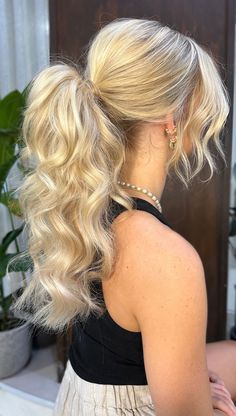 22 Chic and Versatile Hairstyles for the Fashion-Forward Bride I Take You | Wedding Readings | Wedding Ideas | Wedding Dresses | Wedding Theme Formal Updos Ponytail, Curled Hair Ponytail Formal, Volume Ponytail Updo, Textured Low Ponytail Wedding, Fancy Braided Ponytail Hairstyles, Ponytail Updo For Wedding, Prom Ponytail Hairstyles High With Braid, Prom High Pony Tails, Prom Hairstyles Pony