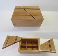 two wooden boxes with dividers on each side and an open drawer in the middle