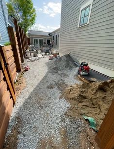 the back yard has been dug up and is ready to be used for landscaping