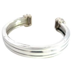 Authentic Tiffany & Co Estate Cuff Bracelet 6.5" Sterling Silver TIF662 This elegant Authentic Tiffany bracelet is made of sterling silver 6.5 inches has a weight of 49.2 Grams. TRUSTED SELLER SINCE 2002 PLEASE SEE OUR HUNDREDS OF POSITIVE FEEDBACKS FROM OUR CLIENTS!! FREE SHIPPING!! DETAILS Style: Cuff Bracelet Length: 6.5 Inches Weight: 49.2 Grams Metal: Sterling Silver The Tiffany & Co items have a natural patina as they are estate silver pieces. Many clients wish to purchase the items as is Tiffany Bracelet, Tiffany Setting, Tiffany And Co Bracelet, Tiffany Diamond, Tiffany Bracelets, Aquamarine Necklace, Gilded Age, Platinum Engagement Rings, Tiffany And Co