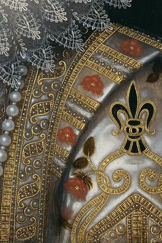 an elaborately decorated silver and gold jacket