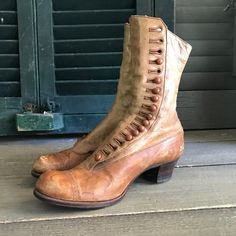 "Antique Button Up Tan Leather Boots Victorian Era Antique tan leather button up Victorian era boots. Cap toes, lined with linen cotton fabric. Wonderful period display boots. Leather soles, wood heels, buttons. Measures; 8.75\" sole (from bottom), 2 5/8\" width ( very narrow), 1.25\" heels , 9.5\" height. Please use measurements to determine sizing, these are antiques. Judging from the measurements I would say they were comparable to a US 4 or 4.5, with a very narrow width. Antique condition sh Leather Cap Toe Boots With Buttons, Vintage Leather Boots With Buttons, Vintage Cap Toe Boots For Fall, Boots Victorian, Antique Shoes, Ankle Boots Tan, Leather Button Up, Wood Heels, Tan Leather Boots