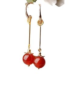 Wunderschöne rote Achat-Originaldesign-Ohrringe aus 14-karätigem Gold
 Aus feinem 14K Gold Achat.
 Messung: 5cm/1.95" * 0.8cm/0.312". Passt problemlos zu täglichen Frisuren, Kleidern und Hemden Elegant Handmade Agate Earrings, Red Agate Dangle Earrings, Elegant Carnelian Dangle Earrings, Elegant Carnelian Earrings, Elegant Carnelian Earrings Gift, Elegant Carnelian Earrings For Gift, Elegant Carnelian Drop Earrings, Elegant Agate Earrings As A Gift, Elegant Agate Earrings For Gift