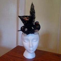 Never Worn. Been In A Hat Box For A While. Attaches With A Comb And Adjustable Elastic Straps. Measures 5" Tall And 6" Wide. Please See My Other Items! I Love To Bundle! Black Themed Top Hat For Halloween, Themed Black Top Hat For Halloween, Black Halloween Themed Top Hat, Themed Black Top Hat For Party, Themed Fitted Mini Hats For Party, Themed Mini Hats For Party, Black Mini Hats For Halloween Themed Events, Black Adjustable Hat For Themed Events, Adjustable Black Hat For Themed Events