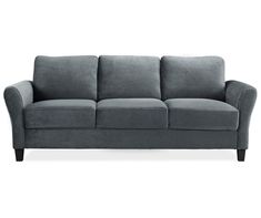 a gray couch sitting on top of a white floor