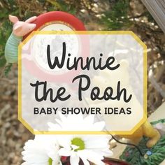 winnie the pooh baby shower ideas with flowers and teddy bears on it, in front of