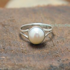 Pearl Ring, Natural Gemstone Ring, Handmade Band Ring, 925 Sterling Silver Ring, Gift For Her, Love Ring, Birthstone Ring, Anniversary Ring About Product:- Gross weight: 3.50 grams according ring size Ring Height & Width: 7x7 mm approx. Band Thickness: 3mm Approx. Gemstone Used: Pearl Metal Used: Solid 925 Sterling Silver Stamp Mark: 925 Metal Color: Shiny Silver Listing is For One (1) Piece Ring. These items are handmade. Jewelry Related: 925 Silver Ring, Middle Finger Ring, Sterling Silver Simple Design Crystal Ring For Anniversary, Classic White Pearl Ring With Simple Design, White Sterling Silver Pearl Ring, White Pearl Sterling Silver Ring, White Pearl Ring With Simple Design For Anniversary, Classic White Ring With Simple Design, Classic White Rings With Simple Design, Silver Sterling Pearl Ring, Sterling Silver Open Pearl Ring