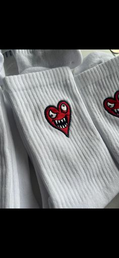 A cute embroidered pair of socks of your choice!, Great gift/Birthday/Valentines/Anniversary - Add initials/names to make it more personal! As soon as your order is processed we will begin to embroider your socks in our studio. This is for TWO embroidery placements, one on each sock. Embroidery Thread:Satin (NEXT DAY DELIVERY ON REQUEST) OR you can create your own custom design! please click on the link to the listing below and follow the instructions in the description: https://www.etsy.com/uk/listing/1018741507/custom-embroidered-logoimage-unisex-t?ref=shop_home_active_1&frs=1 Check out all our other custom designs: https://www.etsy.com/uk/shop/mimiembroiderystudio?ref=search_shop_redirect Customizable White Socks As Gift, Customizable White Socks For Gifts, Customizable White Socks For Gift, White Cotton Socks For Gifts, White Cotton Socks As Gift, White Cotton Socks As A Gift, Sock Embroidery, Spider Embroidery, Socks Logo