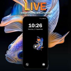 an iphone displaying live wallpapers on it's screen with fish in the background