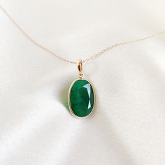 This stunning pendant is set in 14k Solid Yellow Gold with Natural Emerald with utmost precision. It is an unique gemstone pendant for nearly every occasion and is completely hassle-free jewelry. 🔷ABOUT GEMSTONE:  Emerald is often associated with love and romantic relationships. It is believed to promote love, loyalty, and unity, making it a popular choice for engagement and anniversary jewelry. Emerald is often associated with abundance and financial success. It is believed to attract prosperi Elegant Oval Cabochon Emerald Necklace, 14k Gold Oval Jewelry For May Birthstone, Fine Jewelry Emerald Necklace With Polished Finish, Fine Jewelry Emerald Necklace With Polished Finish As Gift, Classic Emerald Necklace With Oval Pendant, Elegant Oval Gemstones For Gifts, Emerald Oval Pendant Necklace As Birthstone Gift, Faceted Oval Pendant Jewelry For Anniversary, Emerald Oval Pendant Necklace For Anniversary