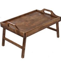 an old wooden tray with handles on it