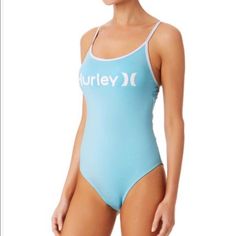 Hurley One Piece Swimsuit -Size: 1x -Hurley Caymen Blue Logo Pipeline One Piece Swimsuit -Decorated With Bold Logo Graphic And Strappy Cutout Back -Full Graphic Text: Hurley -85% Polyester/ 15% Spandex Hurley Logo, Cheeky One Piece Swimsuit, Blue One Piece Swimsuit, Long Sleeve Rashguard, Blue One Piece, Floral One Piece Swimsuit, Bold Logo, Black One Piece Swimsuit, Swim Shirts