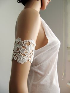 Boho Beach Wedding Handmade Armlet Garter! These romantic beach bridal armlet made from a delicate off white floral lace and finished with elastic band. You will absolutely love these and they will match your wedding dress perfectly. It is sold as a pair !! lace lenght : 9 cm ( from lace to end of fringe ) , arm circumference : 24-25 cm Thanks for checking out my site, and looking at my products. If you have any questions or would like to see more photos please don't hesitate to contact me. Stor Fitted Lace For Summer Weddings, Crochet Lace For Summer Weddings, Summer Wedding Crochet Lace, Arm Band Jewelry, Upper Arm Cuff, Upper Arm Cuffs, Shoulder Necklace, Boho Beach Wedding, Romantic Beach