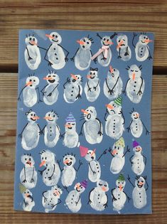 an image of snowmen on a blue background