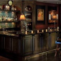 a man sitting at a bar in a restaurant