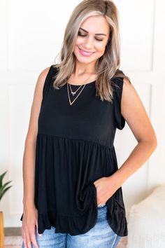 This sweet black tank will set your heart a-flutter. Most everything is better in layers - grab this and a fun cardigan and you're ready for the day! | Ruffles | Black Tank | Babydoll | Women's Tops | Casual Tops | Summer Fashion | Spring Fashion | Trends | Style | Shopping | Cute Shirts | Cheap Tops | Cute Shirts for Women | Casual Style | Online Boutique | Plus Size Fashion | Tunic |  Babydoll Tops | Cardigan | Tank | Tank Top