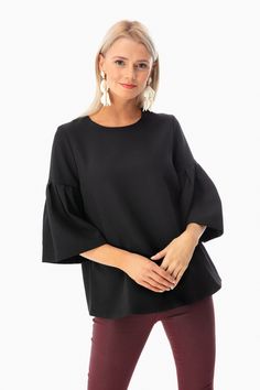 Modern and timeless, the Harper Bell Sleeve Blouse features a flowy silhouette, bell sleeves, and high neckline. Pair with your favorite skinny jeans and heels for a crisp architectural look!

Bell sleeves
Back zipper
Lined
95% polyester, 5% spandex
Care: Machine wash cold, tumble dry low Chic Blouse With Elastic Sleeves For Brunch, Chic Tops With Flared Cuffs For Fall, Evening Tops With Pleated Bishop Sleeves, Chic Ruffle Sleeve Blouse For Night Out, Elegant Tops With Elastic Sleeves For Night Out, Spring Evening Tops With Ruffle Sleeves, Stretch Blouse With Elastic Sleeves For Work, Chic Fall Tops With Flared Cuffs, Elegant Stretch Top With 3/4 Sleeves