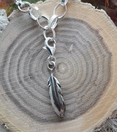 Charm pendant, feather of an eagle in 925 in sterling silver, wearable as a necklace or bracelet, good to combine with earrings from my spirit line . I always send my jewelry insured, to guarantee that it arrives safely. If someone wants to use a cheaper way of dispatch, it`s possible of course, but then I can`t be blamed for any problems with the arrival. Sterling Silver Bracelet With Dangling Charms, Silver Feather Pendant Jewelry, Feathered Dangle Jewelry As A Gift, Dangle Feather Jewelry As A Gift, Eagle Feathers, An Eagle, My Spirit, Feather Pendant, Charm Pendant