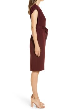 Create a long, lean silhouette with the help of flattering seams and a fitted waistline on this ruffle-sleeve sheath ideal for work or play. 41" length (size 8); 38 1/2" length (size 8P) Exposed back-zip closure V-neck Split flutter sleeves Ties at waist Side-seam pockets Back vent Lined 97% polyester, 3% spandex Dry clean or hand wash, dry flat Imported Dresses Eliza Dress, Eliza J, Anniversary Sale, Petite Size, Size 16, Nordstrom Dresses, Flutter Sleeve, Sheath Dress, Size 12