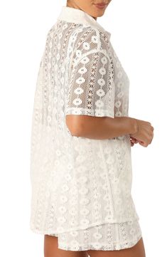 Intricate lace and an oversized fit lends summery charm to this sheer short-sleeve button-up. Front button closure Spread collar Short sleeves Sheer 100% cotton Hand wash, dry flat Imported Spring Button-up Lace Top With Lace Trim, Spring Lace Trim Button-up Top, Spring V-neck Top With Scalloped Lace, Summer Lace Top For Day Out, Crochet Lace Short Sleeve Blouse For Vacation, Short Sleeve Lace Tops With Crochet Detail, Bohemian Short Sleeve Lace Top For Spring, Chic Short Sleeve Scalloped Lace Top, Bohemian Spring Lace Top With Short Sleeves