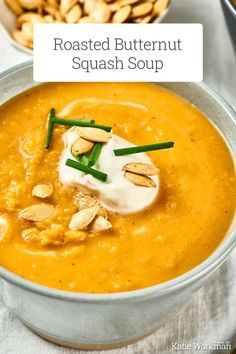 roasted butternut squash soup in a bowl with toasted almonds on the side