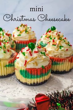 mini christmas cheesecakes with white frosting and sprinkles on top